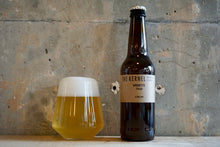 Load image into Gallery viewer, A single 330ml bottle of The Kernel Brewery Grisette - Talus. Stood to the left is a two-thirds glass of golden beer with a foamy white head.